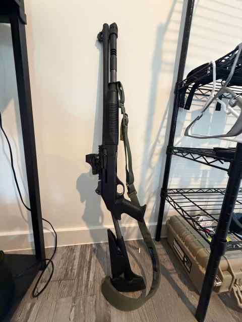 Benelli M4 w/tac stock Holosun optic and range bag