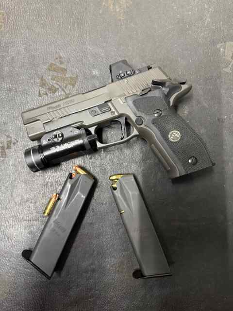 Sig Sauer p226 Legion SAO with Romeo pro 